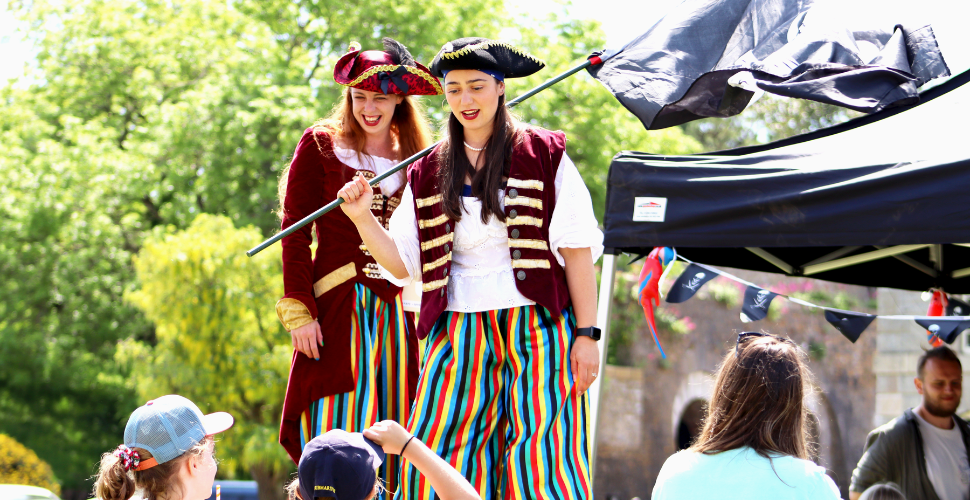 Pirates on stilts at Plymouth Pirates Weekend at Royal William Yard